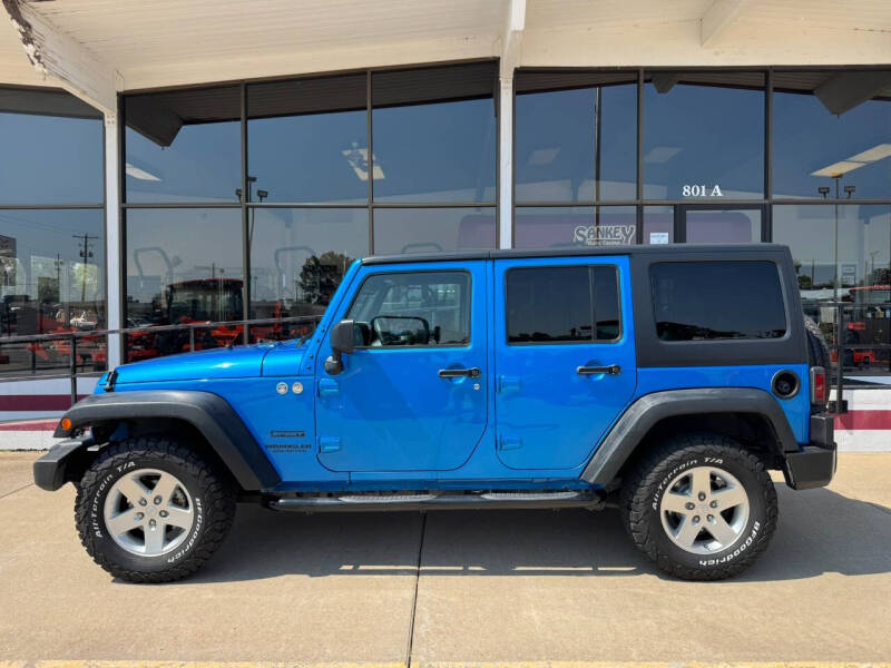 Used 2016 Jeep Wrangler Unlimited Sport S with VIN 1C4BJWDG9GL142694 for sale in Salina, KS