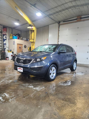 2011 Kia Sportage for sale at WESTSIDE GARAGE LLC in Keokuk IA