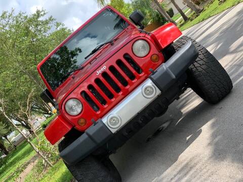 2012 Jeep Wrangler Unlimited for sale at HIGH PERFORMANCE MOTORS in Hollywood FL