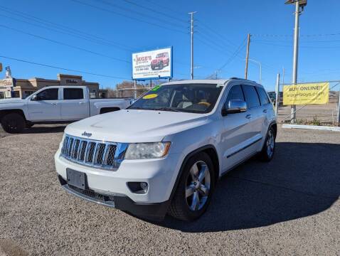 2012 Jeep Grand Cherokee for sale at AUGE'S SALES AND SERVICE in Belen NM