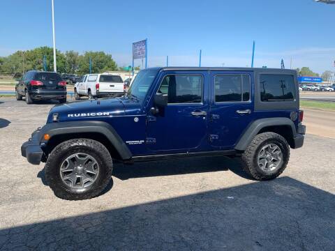 2013 Jeep Wrangler Unlimited for sale at Superior Used Cars LLC in Claremore OK