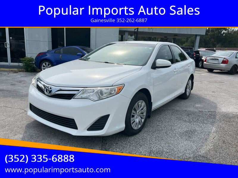 2013 Toyota Camry Hybrid for sale at Popular Imports Auto Sales in Gainesville FL