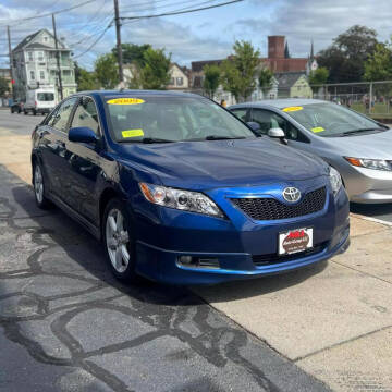 2009 Toyota Camry for sale at A & J AUTO GROUP in New Bedford MA