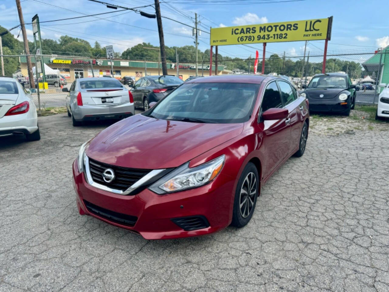 2016 Nissan Altima for sale at ICars Motors LLC in Gainesville, GA