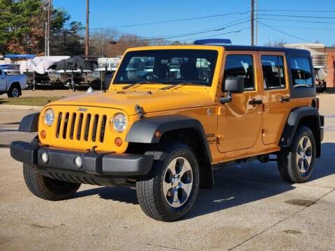 2012 Jeep Wrangler Unlimited for sale at Tyler Car  & Truck Center in Tyler TX