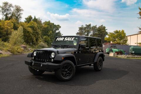 2014 Jeep Wrangler Unlimited for sale at A & R Used Cars in Clayton NJ