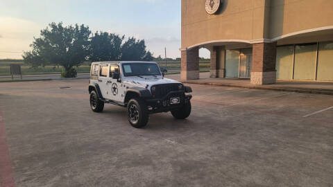 2009 Jeep Wrangler Unlimited for sale at America's Auto Financial in Houston TX