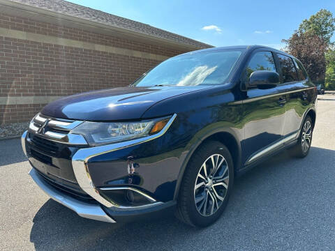 2018 Mitsubishi Outlander for sale at Minnix Auto Sales LLC in Cuyahoga Falls OH