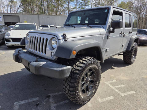 2016 Jeep Wrangler Unlimited for sale at GEORGIA AUTO DEALER LLC in Buford GA