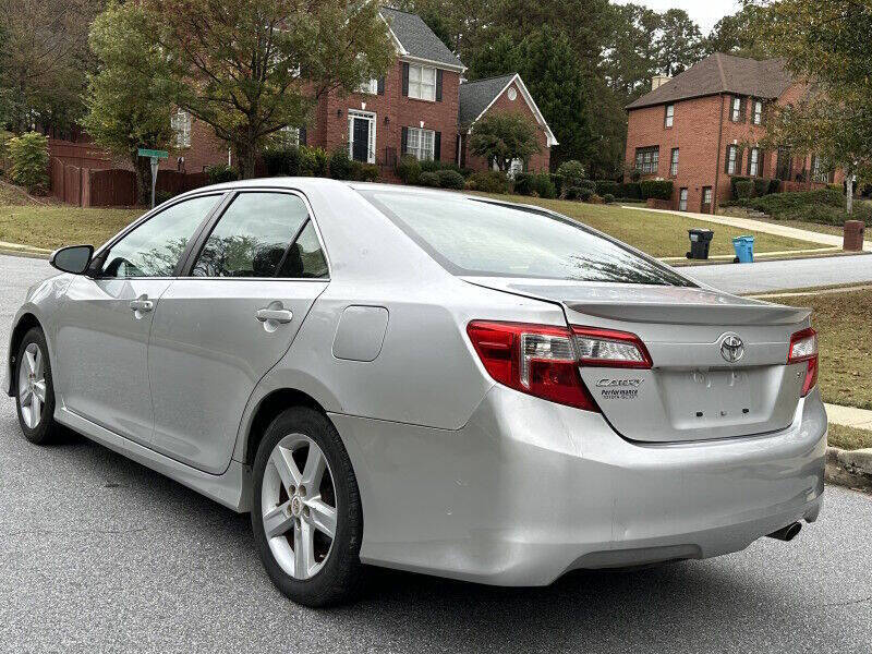 2012 Toyota Camry for sale at SHURE AUTO SALES in Snellville, GA