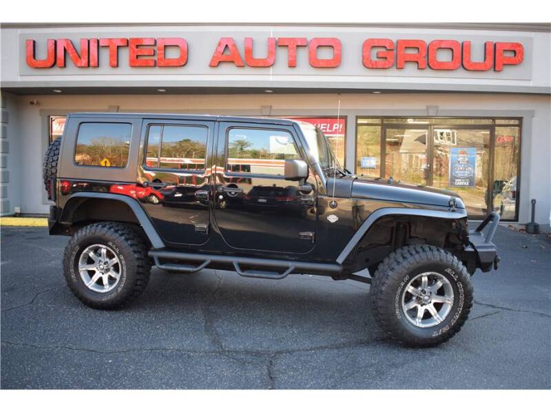 2013 Jeep Wrangler Unlimited for sale at United Auto Group in Putnam CT