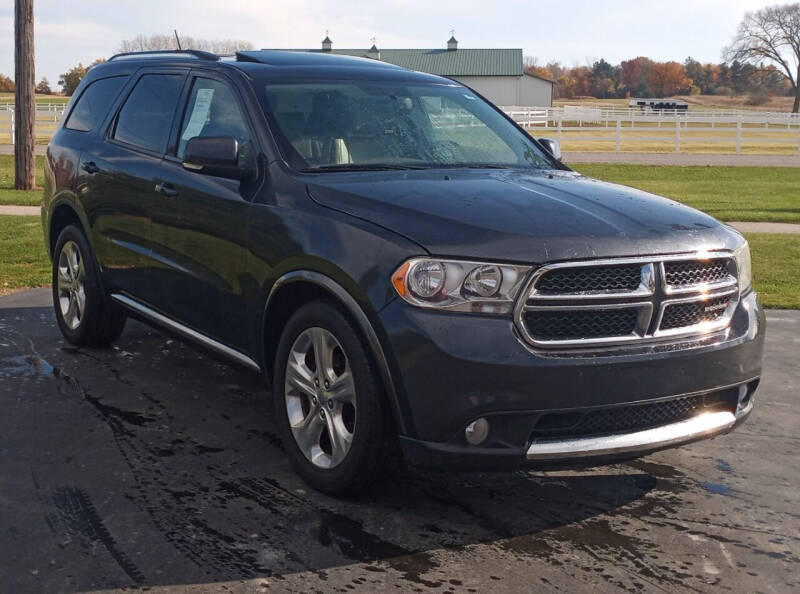 2012 Dodge Durango for sale at Heely's Autos in Lexington MI