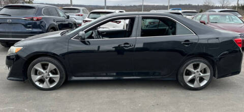 2012 Toyota Camry for sale at VICTORY LANE AUTO in Raymore MO