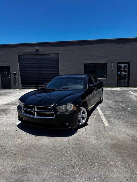 2012 Dodge Charger for sale at ALPHA AUTOMOTIVE SALES in Oakland Park, FL