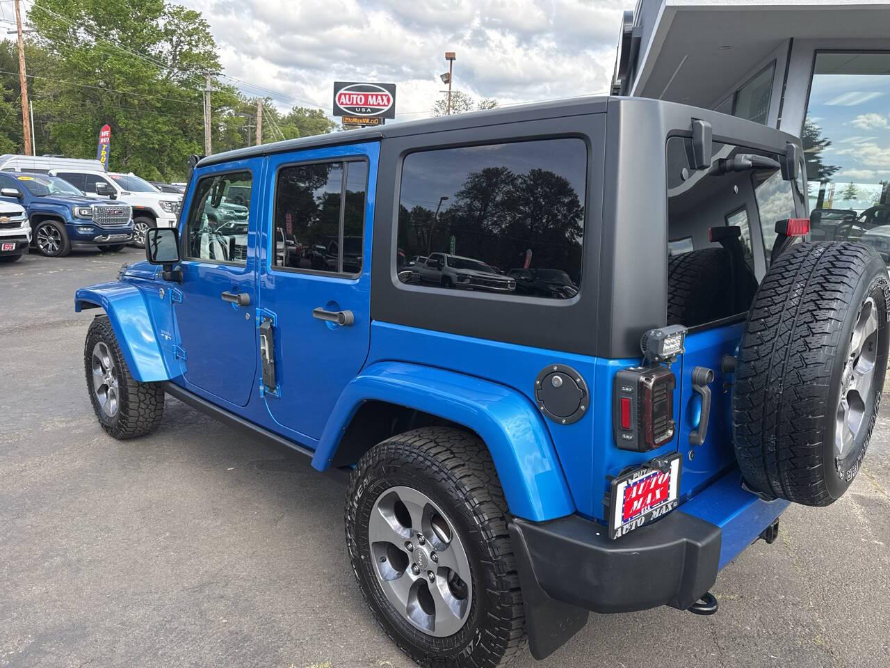 used 2016 Jeep Wrangler Unlimited car, priced at $21,999