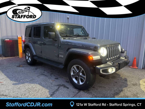 2021 Jeep Wrangler Unlimited for sale at International Motor Group - Stafford CDJR in Stafford Springs, CT