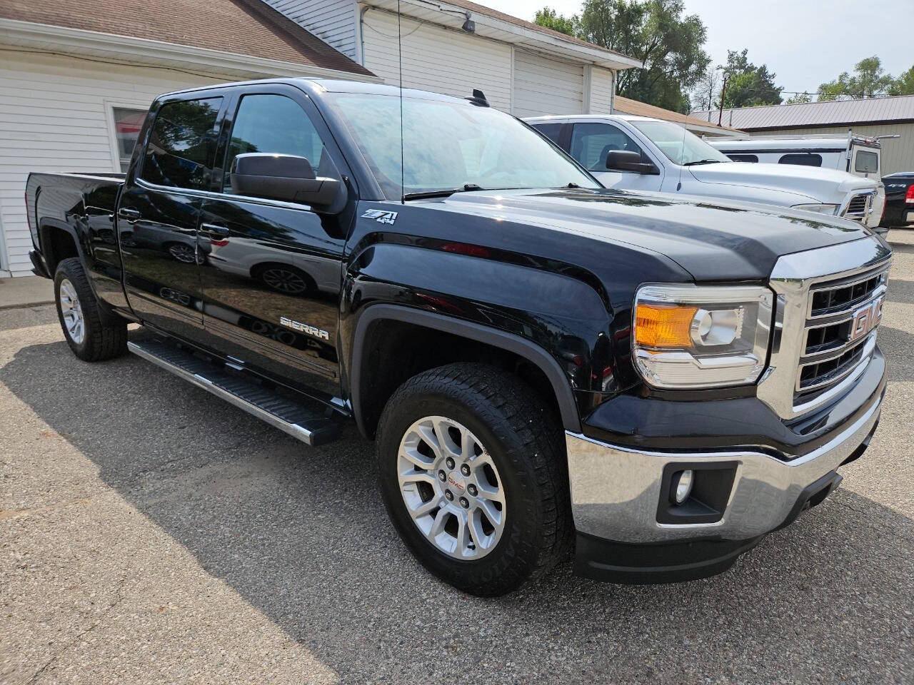 2015 GMC Sierra 1500 for sale at DANGO AUTO SALES in HOWARD CITY, MI