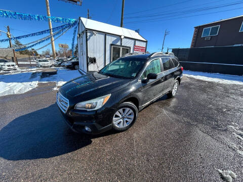 2015 Subaru Outback for sale at McManus Motors in Wheat Ridge CO