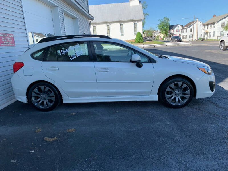 2014 Subaru Impreza for sale at VILLAGE SERVICE CENTER in Penns Creek PA