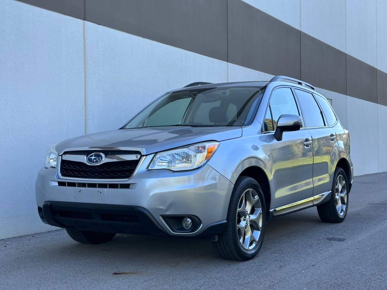 2016 Subaru Forester for sale at Phoenix Motor Co in Romulus, MI