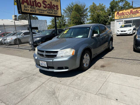 2010 Dodge Avenger for sale at AUTCO AUTO SALES in Fresno CA