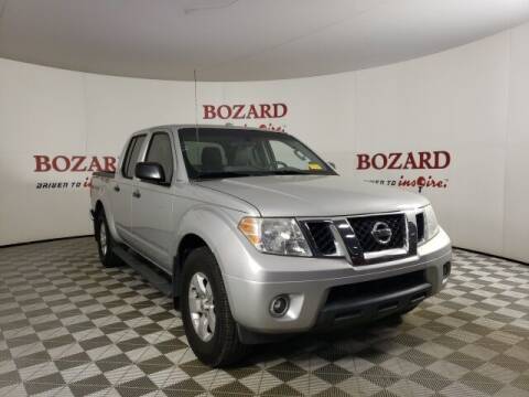 2013 Nissan Frontier for sale at BOZARD FORD in Saint Augustine FL