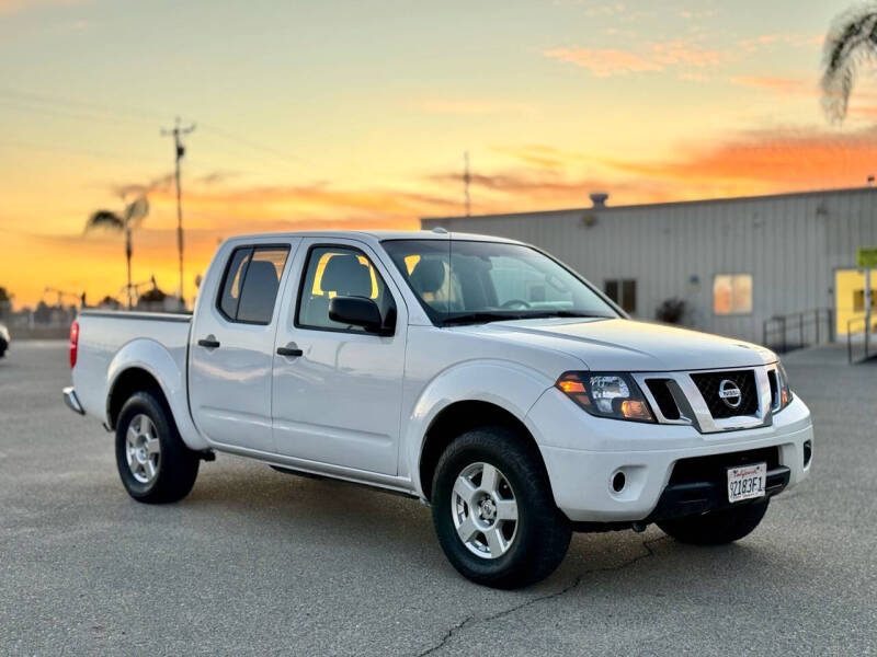 2013 Nissan Frontier for sale at BARMAN AUTO INC in Bakersfield CA