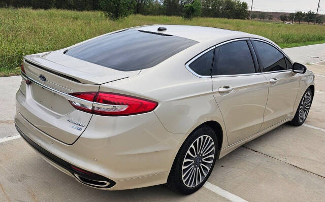 2018 Ford Fusion for sale at CAR MARKET AUTO GROUP in Sugar Land, TX