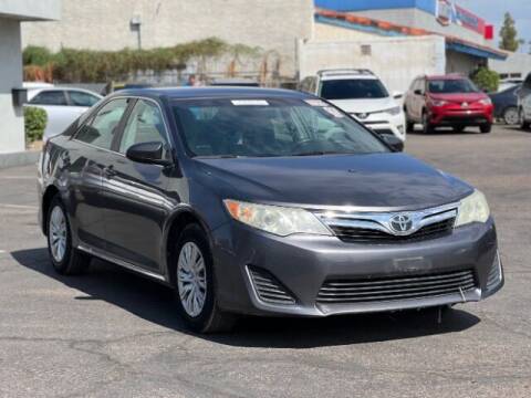 2014 Toyota Camry for sale at Adam's Cars in Mesa AZ