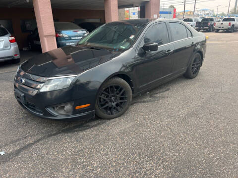 2012 Ford Fusion for sale at AROUND THE WORLD AUTO SALES in Denver CO