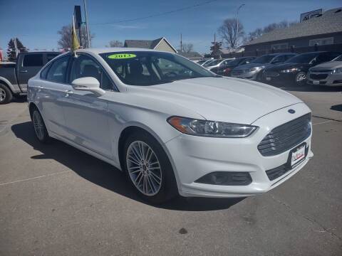 2013 Ford Fusion for sale at Triangle Auto Sales in Omaha NE
