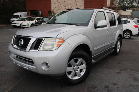 2012 Nissan Pathfinder for sale at Atlanta Unique Auto Sales in Norcross GA