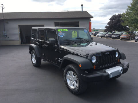 2013 Jeep Wrangler Unlimited for sale at JACK'S AUTO SALES in Traverse City MI