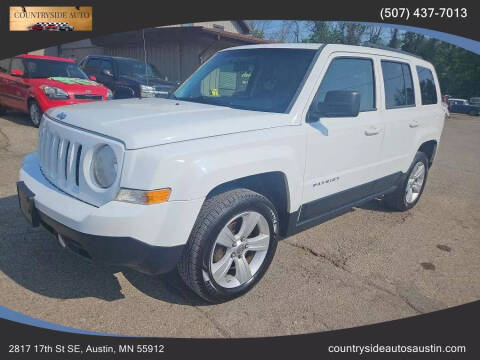 2011 Jeep Patriot for sale at COUNTRYSIDE AUTO INC in Austin MN