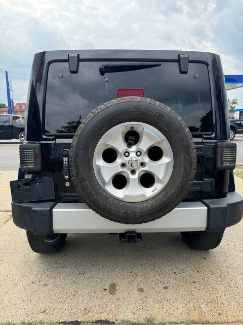 2014 Jeep Wrangler Unlimited for sale at BACH AUTO GROUP in Detroit, MI