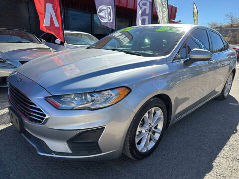 2020 Ford Fusion Hybrid for sale at Duke City Auto LLC in Gallup NM