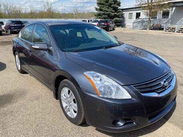 2010 Nissan Altima for sale at WELLER BUDGET LOT in Grand Rapids MI