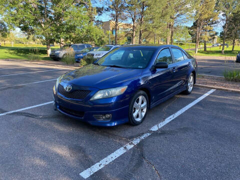 2010 Toyota Camry for sale at QUEST MOTORS in Centennial CO