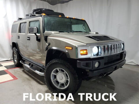 2004 HUMMER H2 for sale at Tradewind Car Co in Muskegon MI