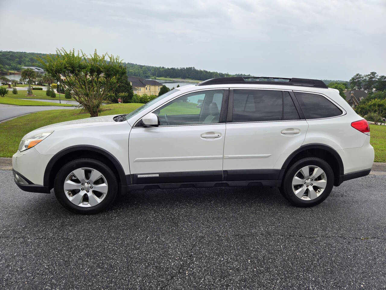 2011 Subaru Outback for sale at Connected Auto Group in Macon, GA