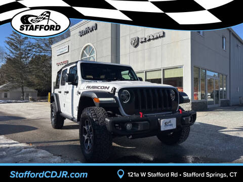 2021 Jeep Wrangler Unlimited for sale at International Motor Group - Stafford CDJR in Stafford Springs, CT