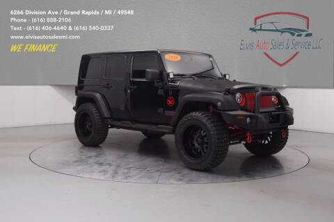 2014 Jeep Wrangler Unlimited for sale at Elvis Auto Sales LLC in Grand Rapids MI