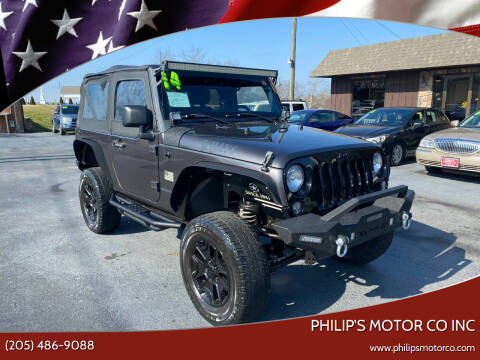 2014 Jeep Wrangler for sale at PHILIP'S MOTOR CO INC in Haleyville AL