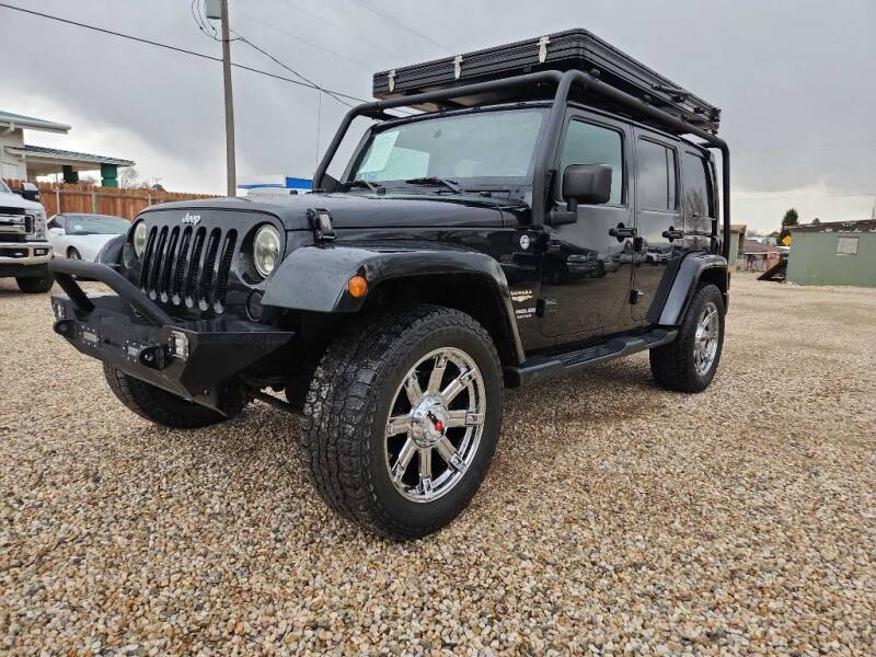2015 Jeep Wrangler Unlimited for sale at Huntsman Wholesale LLC in Melba ID