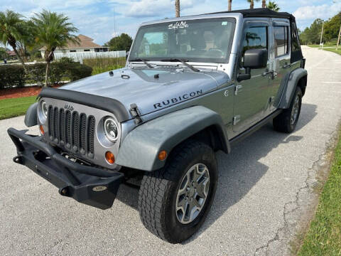 2013 Jeep Wrangler Unlimited for sale at CLEAR SKY AUTO GROUP LLC in Land O Lakes FL