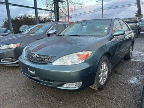 2004 Toyota Camry for sale at Universal Auto Sales Inc in Salem OR