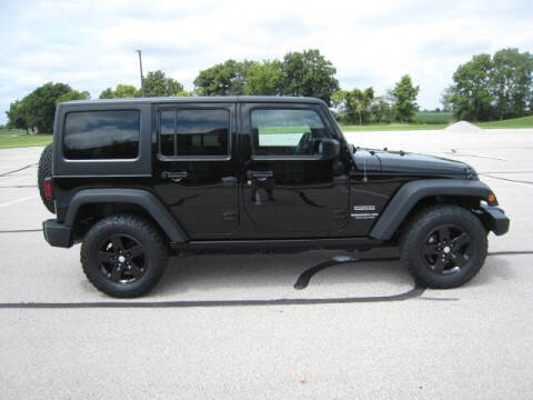 2017 Jeep Wrangler Unlimited for sale at FINNEY'S AUTO & TRUCK in Atlanta IN