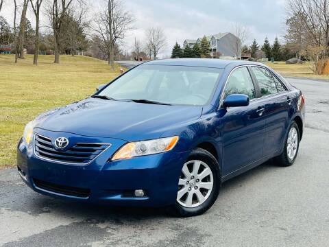 2009 Toyota Camry for sale at Olympia Motor Car Company in Troy NY