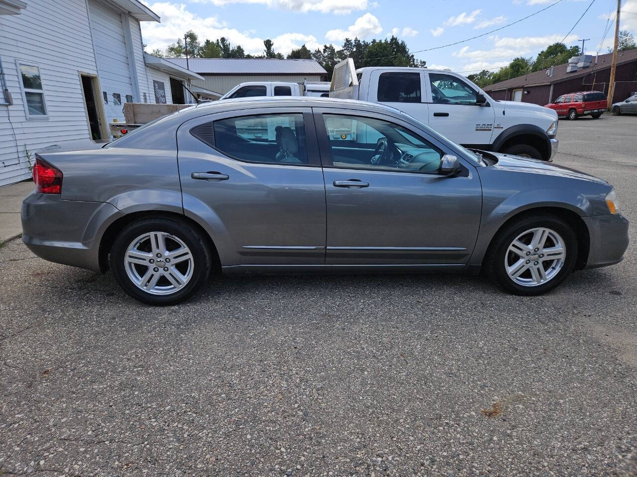 2013 Dodge Avenger for sale at DANGO AUTO SALES in HOWARD CITY, MI