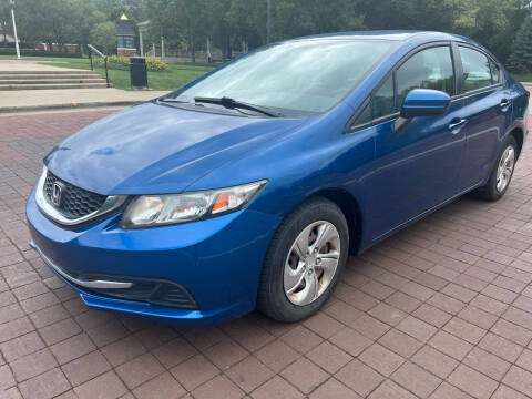 2015 Honda Civic for sale at Carmel Auto in Carmel IN